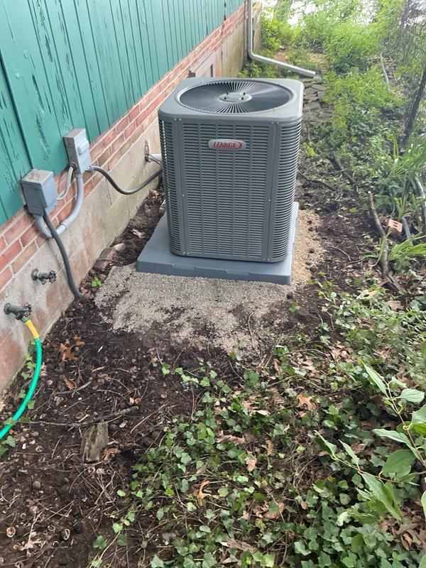 # HVAC Install - A/C Only

Installed new Lennox 3-ton air conditioning system consisting of ML13KC1-036 outdoor condensing unit and CK40CT-30B indoor evaporator coil. Unit positioned on concrete pad in side yard area with proper clearances maintained from brick wall and surrounding structures. Mounted new disconnect box to brick wall with appropriate conduit and electrical connections routed to outdoor unit. Reused existing thermostat and RDS board from previous system, verifying compatibility and proper communication with new equipment. 

Completed refrigerant line connections between indoor and outdoor components, evacuated system to manufacturer specifications, and charged unit with proper refrigerant type and quantity. Connected and tested all electrical connections including power supply, control wiring, and safety circuits. Performed system startup procedures and utilized digital manifold gauges to verify operating pressures and temperatures within normal parameters. Confirmed pr