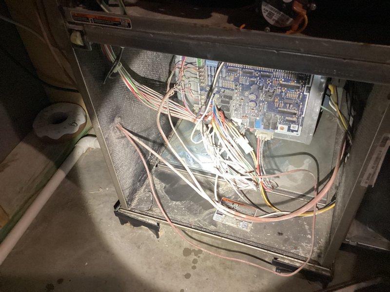 Responded to service call for condensation buildup and water leak on Carrier/BDP evaporator coil unit (Model: CNPVP3017ALA4AAA, Serial: 272DX61646). Inspected internal components and control board, confirmed R-410A refrigerant system with factory-installed TXV metering device, and documented equipment condition with photos for customer records.