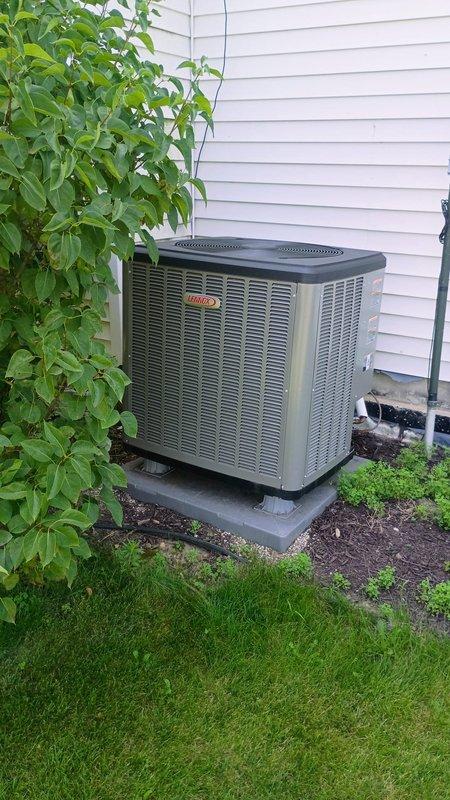 Responded to service call for heat pump unit evaluation due to settlement concerns. Upon arrival, found one-year-old outdoor heat pump unit had settled approximately two inches on backside, causing unit to be out of level. Documented current condition with photographs from all sides of equipment and placed level on unit in multiple directions to capture degree of unlevel positioning. Unit remained operational with no immediate performance issues noted. Consulted with management while on-site to assess structural concerns and determine appropriate corrective action plan for pad stabilization.