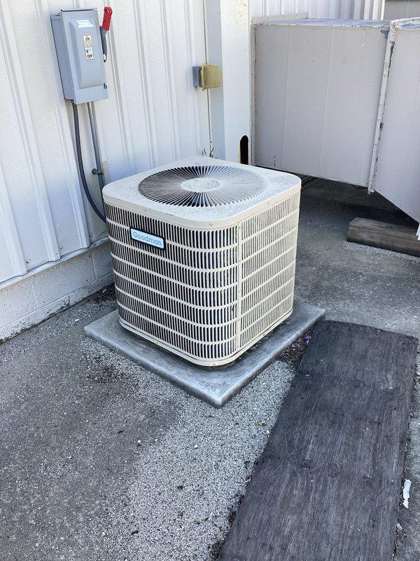 Responded to no cooling complaint on 15-year-old air conditioning system with reported refrigerant leak history. Performed system evaluation and documented existing outdoor condenser unit and indoor equipment installation with photographs for replacement quote preparation. Confirmed unit age and condition warrant replacement consideration due to recurring refrigerant loss and system age beyond typical service life expectancy.