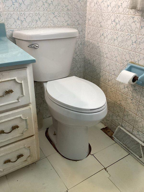Completed toilet installation in upstairs bathroom of 40-year-old residence. Customer-supplied toilet was installed in existing bathroom location with no prior plumbing issues reported. Installation completed successfully with all connections properly sealed and tested for leaks.