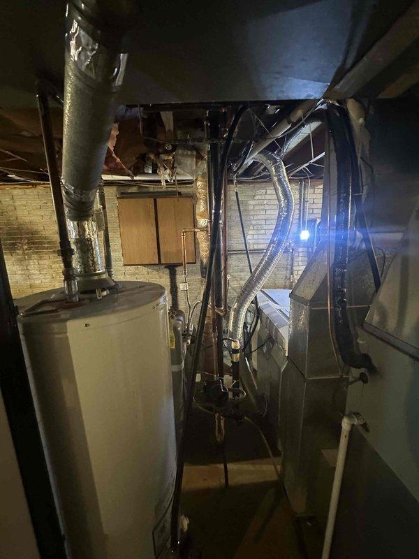 Replaced existing gas line servicing HVAC equipment in basement mechanical room per approved quote. Installation included new exterior gas piping with pressure gauge and manifold assembly mounted on building exterior, with routing through foundation to connect with furnace system. All connections pressure tested and verified for proper operation upon completion.