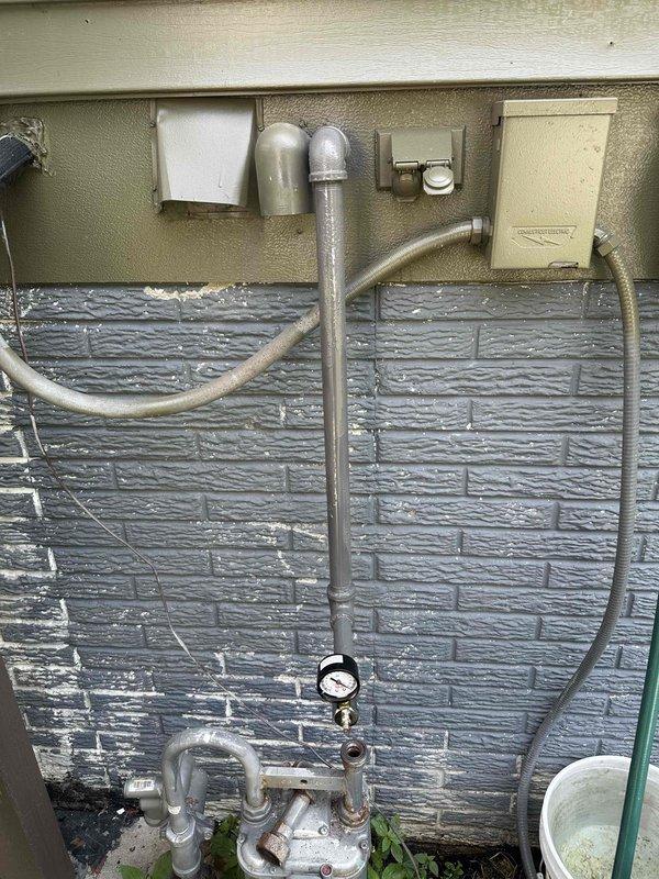 Replaced existing gas line servicing HVAC equipment in basement mechanical room per approved quote. Installation included new exterior gas piping with pressure gauge and manifold assembly mounted on building exterior, with routing through foundation to connect with furnace system. All connections pressure tested and verified for proper operation upon completion.