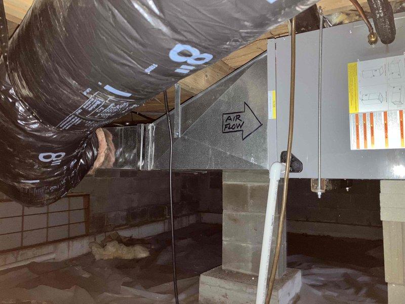 Conducted comprehensive HVAC system evaluation for heat pump replacement estimate at occupied residence. Existing heat pump system approximately seven years old, installed in May 2019, currently operational with no reported performance issues or customer complaints. Inspected outdoor heat pump unit and interior air handler installation located in attic space. Documented existing ductwork configuration including insulated flexible duct runs rated at R-8 and metal supply plenum with directional airflow markings. Evaluated electrical disconnect panel and system controls. Photographed equipment placement, duct connections, and attic access conditions to support replacement proposal. Provided customer with equipment options and pricing for complete heat pump system replacement.