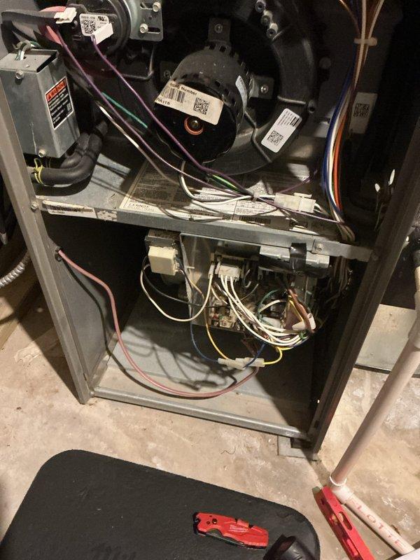 Accessed property through unlocked side garage door per customer authorization and successfully installed RDS (Rapid Disconnect System) board on existing HVAC system. Connected all electrical wiring to new control board, verified proper digital display functionality, and secured all wire connections within furnace cabinet. Installation completed with all components properly mounted and system ready for operation.
