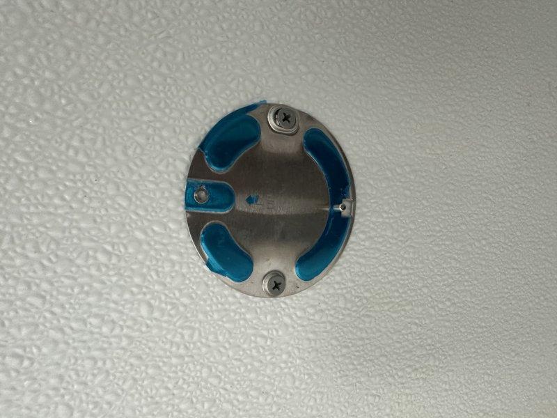 Responded to service callback for two automatic flush sensors that were detaching from toilet fixtures. Upon inspection, found that adhesive mounting method was failing due to textured wall surfaces preventing proper adhesion. Removed existing sensors, assessed mounting locations, and reinstalled units using alternative mechanical fastening method suitable for textured surfaces to ensure secure, permanent attachment and proper sensor operation.