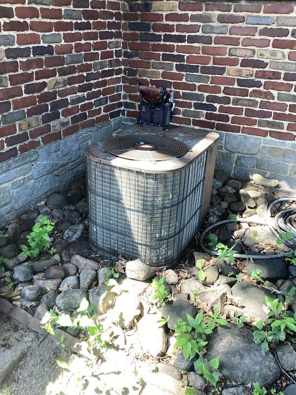 Completed comprehensive AC tune-up on 30+ year old outdoor condensing unit and 77-year old Temp-O-Matic Williamson furnace system. Performed first-time coil cleaning on evaporator coil which had never been serviced, addressing reduced cooling capacity issues. Inspected and cleaned outdoor condenser unit, cleared vegetation and debris from around equipment, and verified system operation to improve cooling performance during high heat conditions.