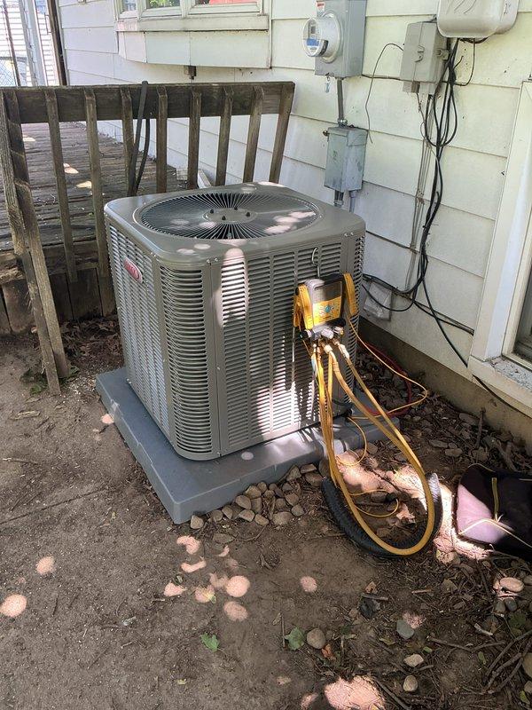 Completed installation of new air conditioning system including ML13KC1-030 outdoor condensing unit, CK40CT-30B evaporator coil, and S200 thermostat. Unit was set on concrete pad with proper leveling and secured refrigerant line connections. Performed system startup, verified proper refrigerant charge using digital testing equipment, and confirmed operational parameters within manufacturer specifications. Inspected existing furnace heat exchanger for cracks as requested; existing heating system remains in service. All electrical connections completed to code, system tested and left in full operational condition.