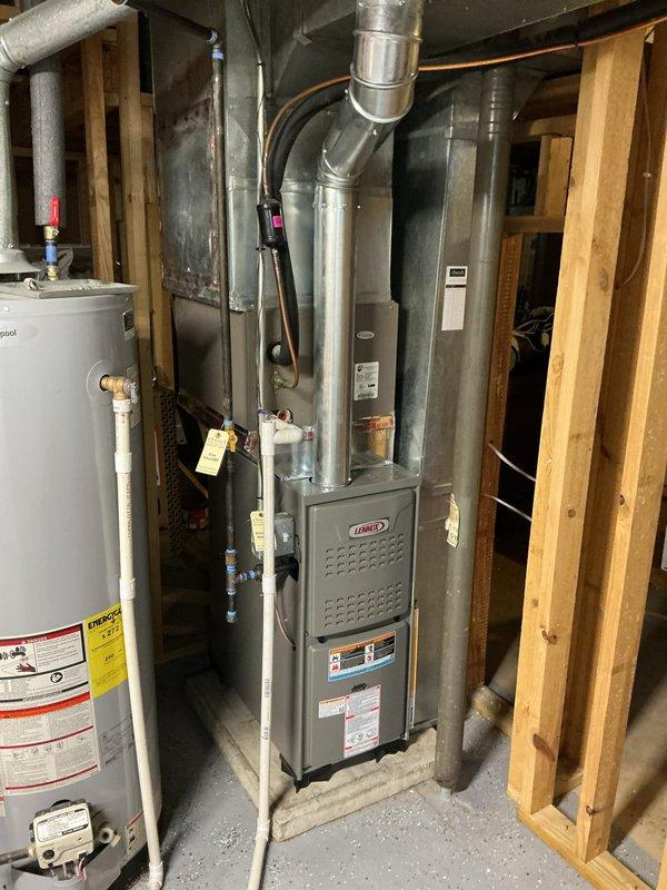 Completed installation of Lennox ML180UH045 furnace in basement mechanical room with all necessary ductwork connections and electrical hookups. Installed new T4/T6/S200 thermostat for system control and reused existing filter elbow to maintain proper air filtration. Verified all refrigerant line connections, tested system operation, and confirmed proper airflow through 16x25x1 filter configuration with financing arranged for the complete installation.