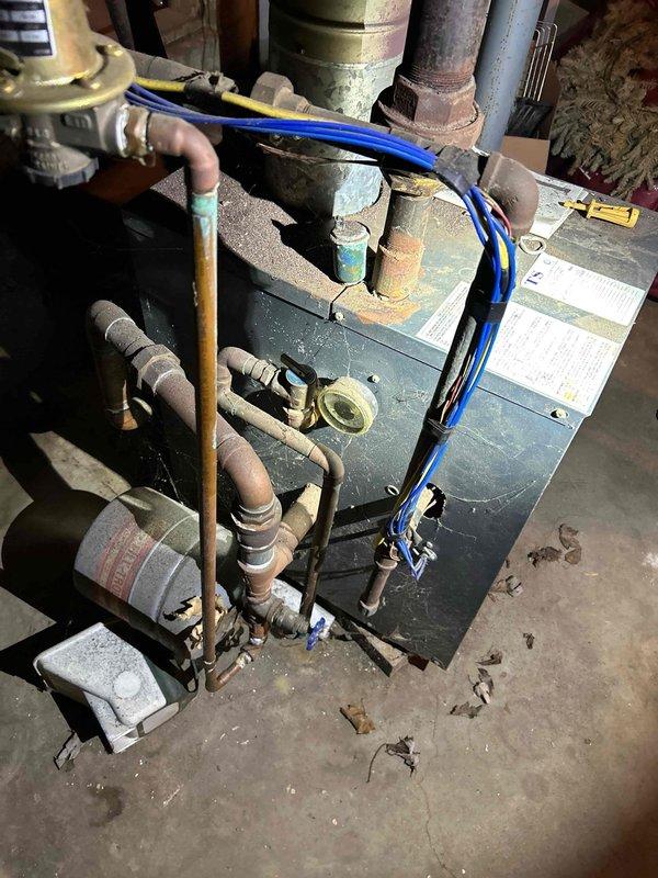 Responded to customer concern regarding unusual drainage behavior in basement area. Conducted thorough inspection of basement plumbing system and heating equipment connections. Evaluated drainage patterns, pipe configurations, and potential sources of abnormal water flow near boiler installation. Documented existing conditions of copper piping, heating unit connections, and associated plumbing infrastructure showing age-related wear and oxidation. Assessed 2-inch pipe system and mechanical equipment for proper drainage function and identified areas requiring attention.
