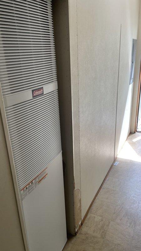Completed furnace installation at Mid-City property, installing Coleman DGAX unit in interior closet space. Air conditioning coil was not reinstalled per customer request due to non-functional AC system, streamlining the installation process and reducing equipment requirements.