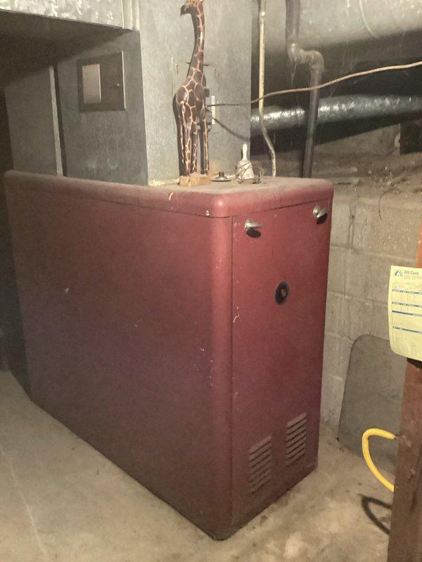 Responded to service call for 8-year-old gas water heater with reported venting issues that had been shut off by customer as a safety precaution. Upon arrival, performed comprehensive inspection of water heater and venting system. Examined the unit's combustion chamber, burner assembly, and flue connections for proper operation and code compliance.

Conducted thorough assessment of the venting configuration, including horizontal and vertical vent piping runs. Identified significant condensation accumulation on metal ductwork in basement area, indicating potential draft issues or improper venting conditions. Inspected vent termination point and checked for blockages, debris, or structural concerns that could impair proper exhaust flow.

Evaluated the water heater's draft hood connection and verified clearances from combustible materials. Tested combustion air supply to ensure adequate ventilation for safe operation. Examined all pipe connections, joints, and seals throughout the venting