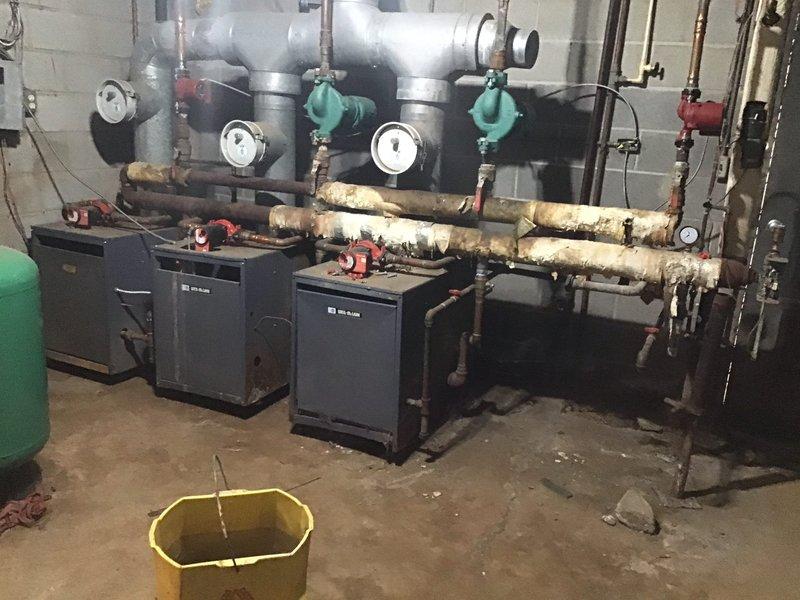 # HVAC Maintenance - Planned Single Maintenance

Completed first visit air conditioning maintenance as part of new enrollment service agreement. Performed comprehensive system inspection and documentation of existing mechanical equipment including dual boiler heating system with associated piping network, circulator pumps, expansion tanks, and pressure controls. Observed significant corrosion on horizontal pipe runs and oxidation on copper piping throughout mechanical room, which was photographed for record and future reference.