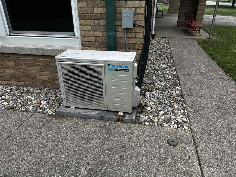 Evaluated existing 5-year-old Daikin 1.5-ton mini split system that was struggling to maintain comfortable temperatures during peak afternoon heat, with indoor temperatures reaching the 80s. Inspected outdoor condenser unit and indoor air handler to assess system performance and capacity limitations. Determined that the existing equipment is undersized for the cooling load requirements of the space. Provided comprehensive estimate for replacement with properly sized mini split system to achieve adequate cooling capacity and improved temperature control during high-demand periods.
