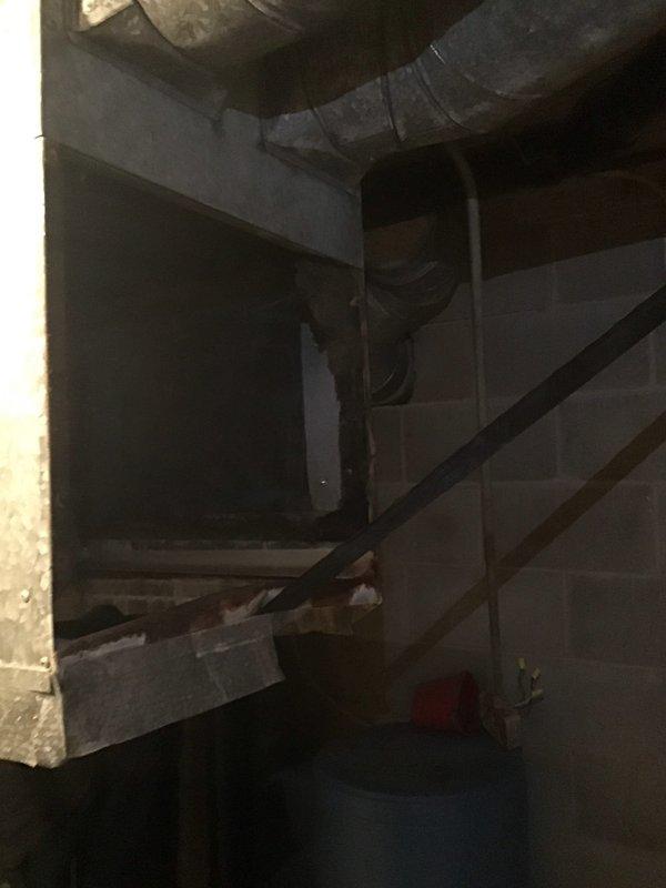 Completed installation of new air conditioning system in basement utility area. Installed air handler unit with associated ductwork and blower assembly, securing all components to existing structural framework. Routed flexible ductwork along ceiling joists and connected to main distribution system. All equipment tested and operational upon completion.