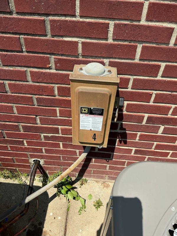 Completed installation of two complete HVAC systems at residential property. Systems include new outdoor condensing units mounted on concrete pads with proper electrical disconnects installed on exterior brick wall, new indoor air handling equipment, and associated refrigerant line sets. All electrical connections, conduit runs, and disconnect boxes installed per code requirements. Systems tested and operational upon completion.