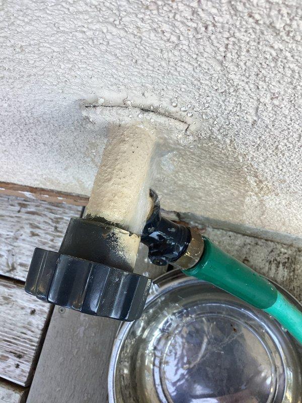 Responded to service call for leaking outdoor wall-mounted frost-free spigot. Upon inspection, identified failed internal seals causing water leakage during operation. Repaired self-draining spigot by replacing worn valve components and internal sealing mechanisms. Tested unit for proper operation and verified no leakage at connection points and complete drainage function to prevent freeze damage.