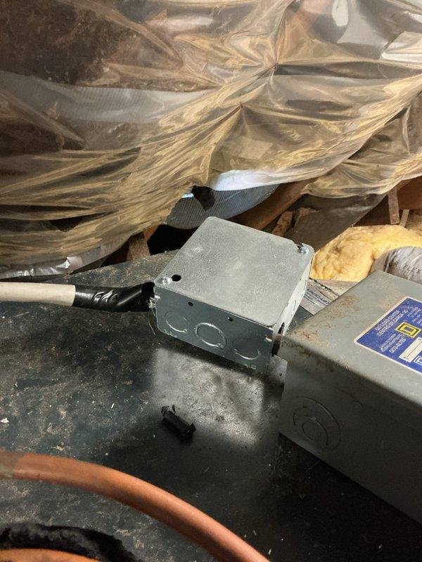Responded to no cooling call for follow-up repair after pest damage to attic air handler wiring. Previous technician had identified chewed wiring in electrical junction box. Upon arrival, confirmed homeowner had addressed pest issue and unit was ready for rewiring. Accessed attic air handler and inspected damaged electrical connections at junction box and internal unit wiring. Removed compromised wire sections and installed new electrical connections using proper wire nuts and secure terminations. Verified all electrical connections were tight and properly insulated. Restored power to unit and tested system operation. Confirmed air handler energized correctly and cooling cycle initiated properly. System operating within normal parameters with no further electrical issues detected.
