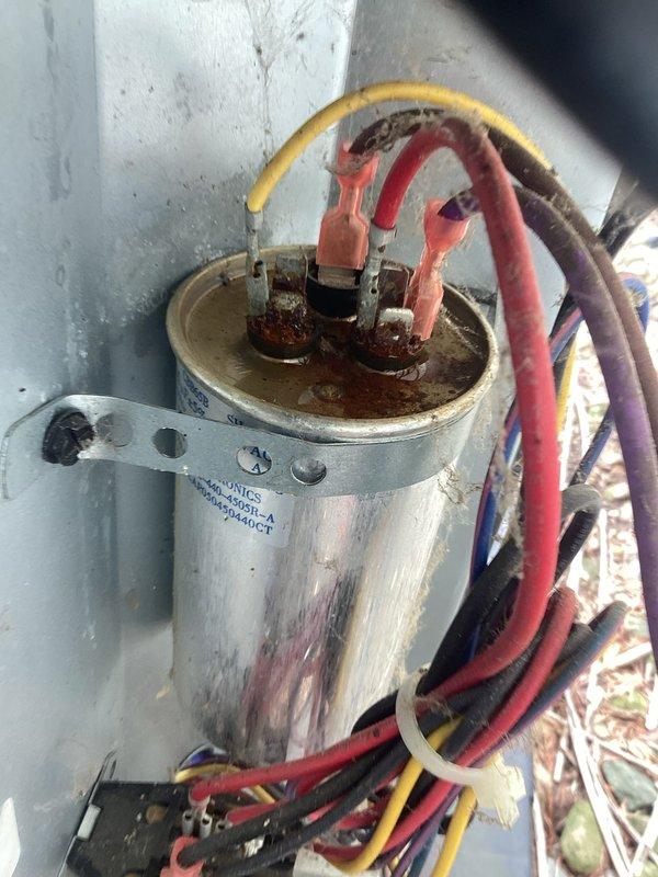 Completed planned maintenance on both air conditioning and heating systems. Performed comprehensive inspection of outdoor unit electrical compartment, noting weathered refrigerant line insulation and minor dirt accumulation typical of outdoor exposure. Observed capacitor terminals with corrosion present at connection points. Replaced 14x20x1 air filter. All system components functioning within normal operating parameters at time of service. Documented equipment condition with photographs for maintenance records.