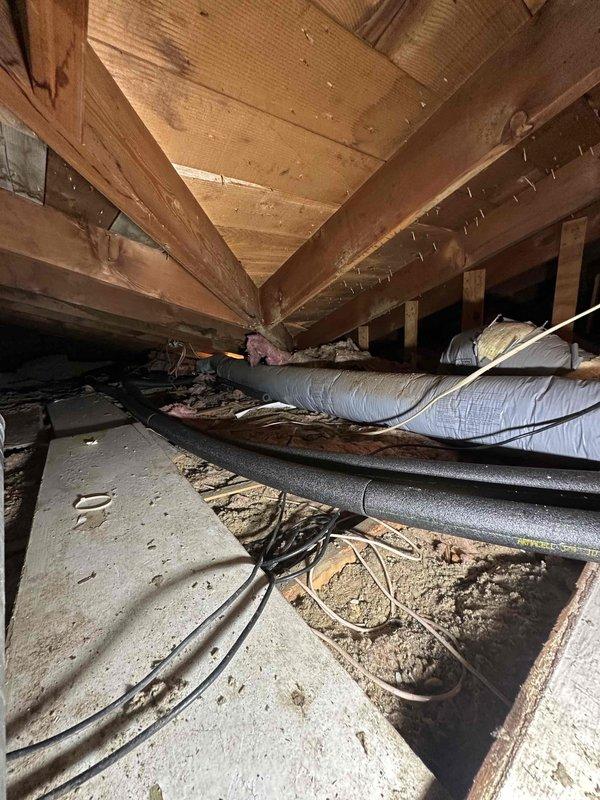 Responded to water leak issue in attic space and successfully reran water supply lines through the crawl space area. Routed new plumbing lines alongside existing HVAC ductwork and secured installation according to code requirements, ensuring proper support and clearance from structural beams and insulation materials.