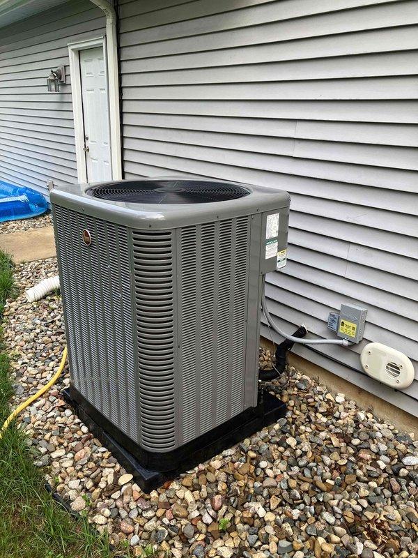 Conducted comprehensive assessment of residential HVAC system following water intrusion event that compromised both gas furnace and air conditioning equipment. Water infiltrated through AC vents, traveled to the gas furnace in the basement, and accumulated in ductwork connected to bathroom and laundry areas, causing structural damage to system components over time. Following completion of water restoration and mold remediation by specialized contractors, performed detailed inspection of affected HVAC infrastructure including furnace unit, air handler, ductwork, and outdoor condenser unit. Documented existing conditions through photographic evidence showing galvanized ductwork, metal plenum panels, and outdoor AC unit positioned on gravel pad against building exterior. Prepared itemized estimate documentation for insurance claim purposes detailing full system replacement requirements for both gas furnace and connected air conditioning equipment due to extent of water damage and contamin