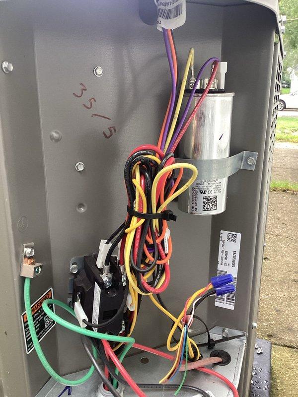 Completed first annual planned maintenance visit on 6-month-old HVAC system. Performed comprehensive inspection of outdoor condensing unit, including electrical panel examination, capacitor check, and wiring connections verification. Documented system condition with service photos showing control panel components, wire connections with proper grounding, and overall unit exterior. Unit operating within normal parameters with minor dirt accumulation noted on condenser fins consistent with outdoor exposure.