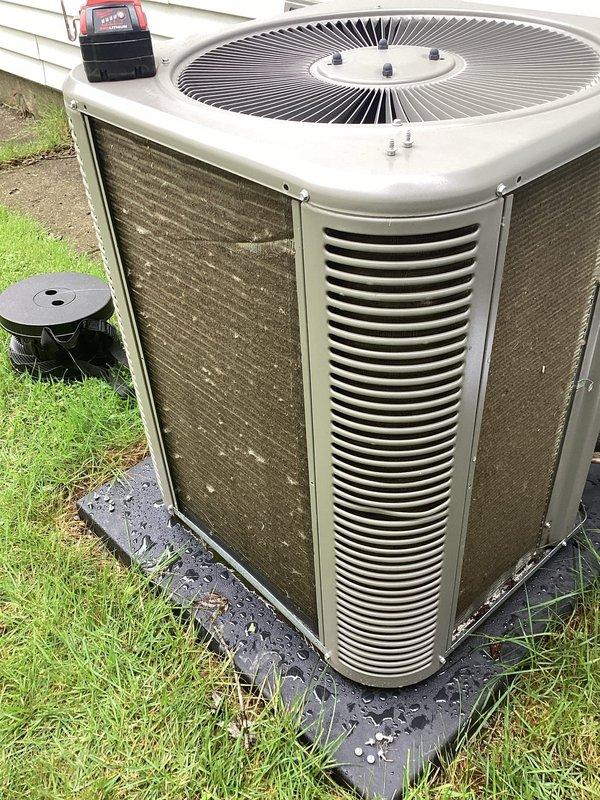 Completed first annual planned maintenance visit on 6-month-old HVAC system. Performed comprehensive inspection of outdoor condensing unit, including electrical panel examination, capacitor check, and wiring connections verification. Documented system condition with service photos showing control panel components, wire connections with proper grounding, and overall unit exterior. Unit operating within normal parameters with minor dirt accumulation noted on condenser fins consistent with outdoor exposure.