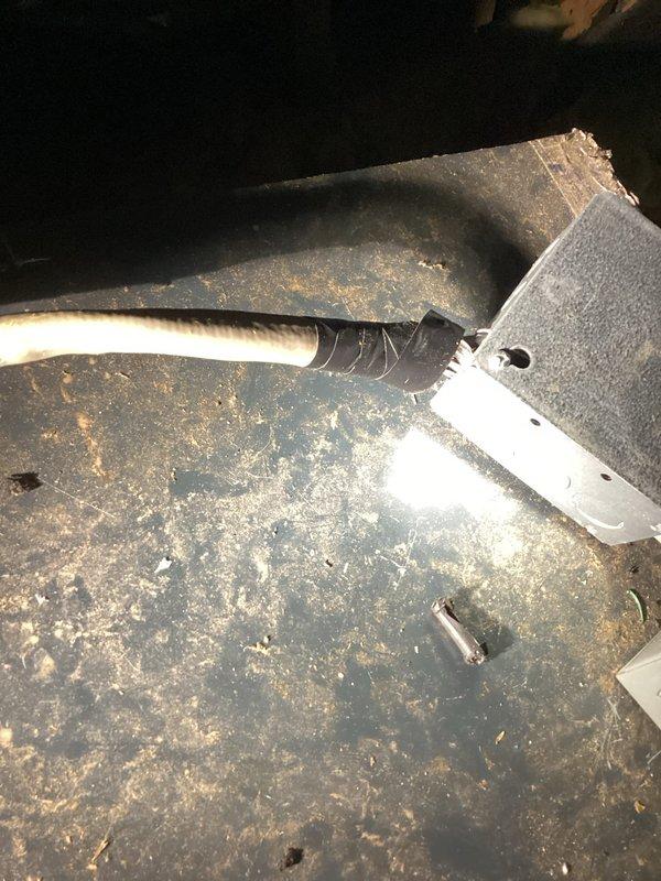 Responded to no cooling complaint on a 10-year-old system with no airflow from vents and no tripped breakers. Upon inspection, accessed attic-mounted air handler and ductwork system, documenting heavy dust accumulation throughout mechanical space and on equipment surfaces. Performed diagnostic evaluation of air handler unit and associated ductwork connections to determine cause of system failure.