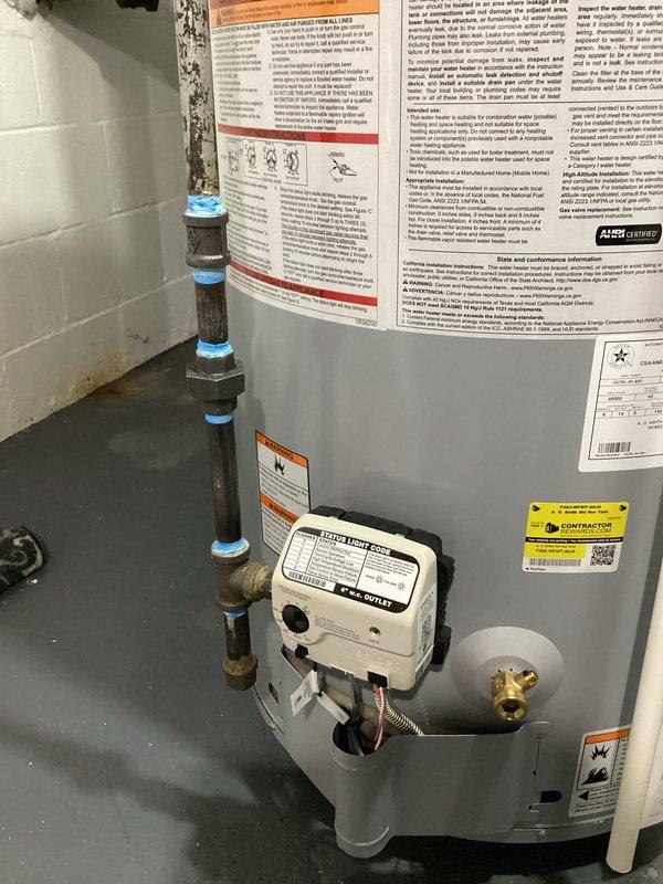 Replaced existing water heater with a new 40-gallon short A.O. Smith natural draft residential tank unit, model GCRL-40. Installed a shut-off valve on the cold water supply line to provide proper isolation capability for future maintenance and emergency shutdowns.