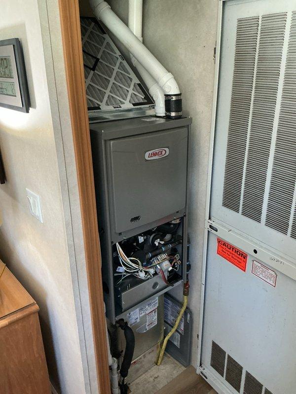Completed follow-up service call to address thermostat and module installation that was previously incomplete. Accessed residential HVAC system consisting of Lennox furnace and air handler unit located in utility closet. Successfully installed and configured digital thermostat on interior wall, verifying proper wiring connections and system communication with furnace control board. Tested thermostat functionality and confirmed accurate temperature readings and system response.
