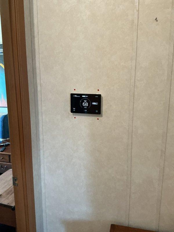 Completed follow-up service call to address thermostat and module installation that was previously incomplete. Accessed residential HVAC system consisting of Lennox furnace and air handler unit located in utility closet. Successfully installed and configured digital thermostat on interior wall, verifying proper wiring connections and system communication with furnace control board. Tested thermostat functionality and confirmed accurate temperature readings and system response.