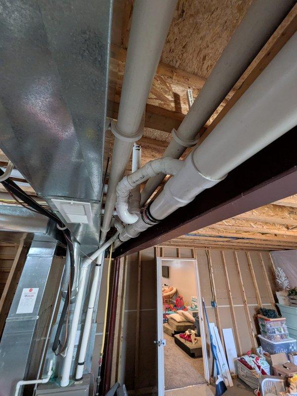 Completed water softener replacement per approved quote in basement utility area. Performed preventive maintenance tune-up on furnace system, including filter inspection and operational testing. Installed equipment connects to existing PEX manifold distribution system serving radiant heating zones. All components secured to structural supports with proper clearances maintained for code compliance and future serviceability. System tested and operational upon completion.