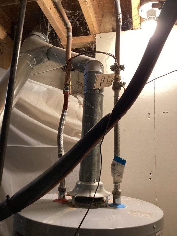 Completed planned maintenance on 26-year-old furnace system with no reported issues or operational concerns. Performed comprehensive inspection of internal components including blower motor, gas valve assembly, electrical connections, and wiring harnesses; all components found to be properly secured and functioning within normal parameters. Verified system integrity, documented equipment condition through photographic records, and confirmed unit remains operational for continued service.