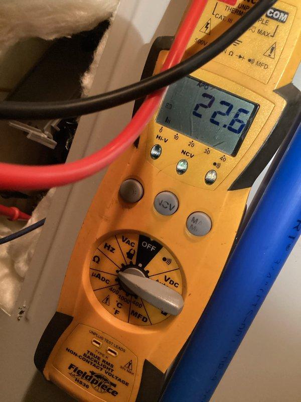 Responded to no hot water complaint on a 2022 Bradford White 50-gallon electric water heater, model RE350S6-1NCWM. Used multimeter to test electrical supply and confirmed 226 volts present at unit. Diagnosed failed heating element preventing water from reaching proper temperature. Replaced defective heating element and restored hot water operation to customer satisfaction.