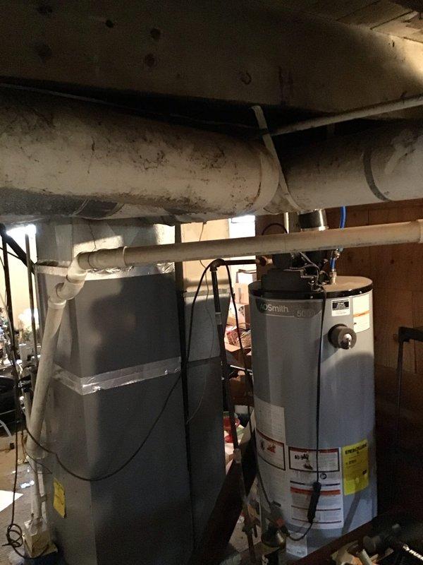 Conducted comprehensive HVAC system assessment in residential basement for complete system replacement estimate. Evaluated existing traditional forced-air heating and cooling infrastructure, including furnace, air conditioning unit, and ductwork distribution system throughout the home. Customer expressed interest in full system replacement including new furnace, air conditioner, and complete ductwork renovation due to current system age and efficiency concerns. Documented existing mechanical room layout, utility configurations, and spatial constraints for equipment replacement planning. Assessed basement infrastructure including exposed joists, existing PVC plumbing, ventilation systems, and available clearances for new equipment installation. Reviewed customer requirements for traditional split-system HVAC configuration and discussed financing options for complete system upgrade project.