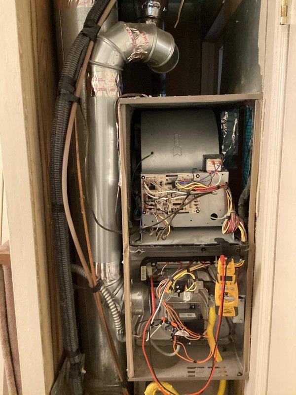 Completed scheduled heating maintenance on Rheem furnace model RGF1L060AE12MP12A as part of HVAC membership plan. Performed comprehensive system inspection including visual examination of internal components, electrical connections, blower motor assembly, and control board; verified proper operation of all safety switches including door switch, rollout switch, and vent thermostat; confirmed unit specifications of 60,000 BTUH input and 48,000 BTUH output with temperature rise range of 30-60°F within manufacturer parameters.