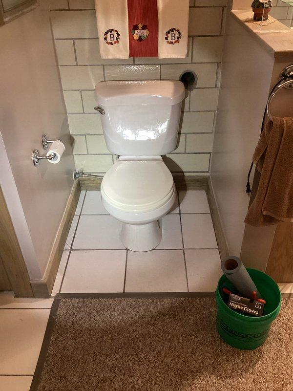 Responded to lower level bathroom for toilet repair. Upon inspection, found worn flapper and chain assembly causing improper seal and flush malfunction. Removed old flapper and chain from flush valve. Installed new flapper and chain assembly, adjusted chain length for proper operation, and tested flush mechanism multiple times to ensure proper sealing and water flow. Toilet now operating normally with no leaks detected.
