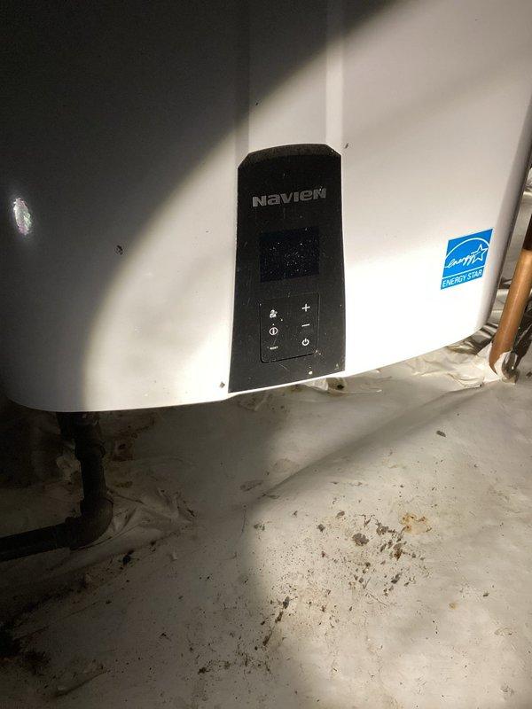 Responded to callback regarding no hot water following previous water service work. Upon arrival, inspected Navien tankless water heater installation in basement. Verified unit power, gas supply, and water connections. Checked control panel display and operational settings. Unit found to be functioning properly with no error codes present. Confirmed hot water delivery restored to fixtures. Additionally, picked up and installed 16x25x3 furnace filter as requested. System tested and verified operational upon completion.