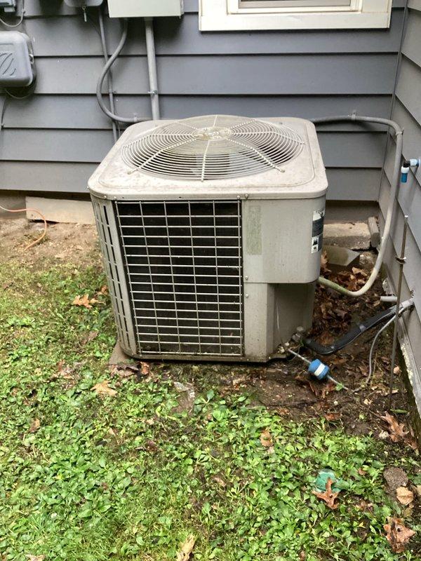 # HVAC Maintenance Service Completed

Performed planned furnace maintenance on a residential heating system approximately 10+ years old. Conducted comprehensive inspection of Bryant furnace unit located in interior utility closet, verifying operational status of all components including burner assembly, heat exchanger, and blower motor. Replaced air filter to manufacturer specifications to ensure proper airflow and system efficiency.

Inspected outdoor condensing unit positioned against building exterior, noting unit's age-appropriate condition with normal weathering. Verified refrigerant line connections and electrical conduit integrity. Cleared debris and vegetation from around condenser base to maintain adequate airflow clearance. Documented system configuration including refrigerant line routing and electrical connections.

All equipment operating within normal parameters upon completion of maintenance procedures.