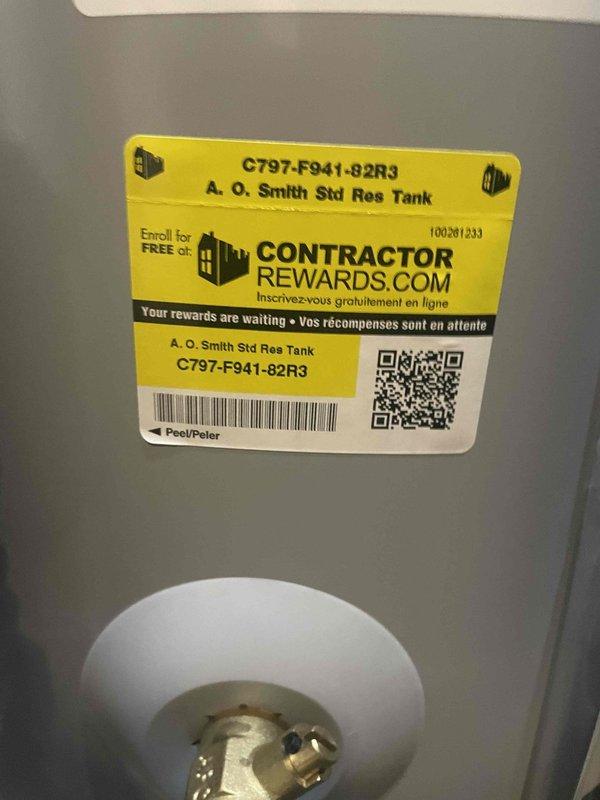 Completed full installation of A.O. Smith residential tanked water heater in utility closet per quoted specifications. Unit was properly positioned, connected to existing copper supply lines, and integrated with adjacent water treatment system. All plumbing connections were secured, system was tested for proper operation, and installation met code requirements.