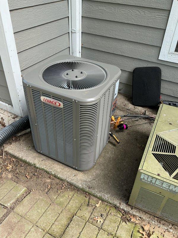Completed installation of new Lennox air conditioning condenser unit on existing concrete pad at residential property. Connected refrigerant lines to outdoor unit, performed proper evacuation and charging procedures using manifold gauges, and verified system operation. Reused existing thermostat and wiring, ensuring proper communication between indoor and outdoor equipment for optimal cooling performance.