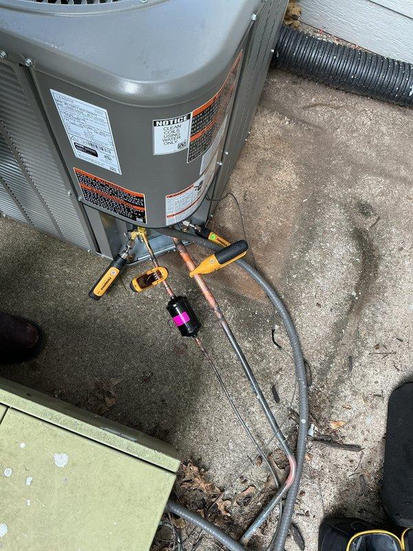 Completed installation of new Lennox air conditioning condenser unit on existing concrete pad at residential property. Connected refrigerant lines to outdoor unit, performed proper evacuation and charging procedures using manifold gauges, and verified system operation. Reused existing thermostat and wiring, ensuring proper communication between indoor and outdoor equipment for optimal cooling performance.