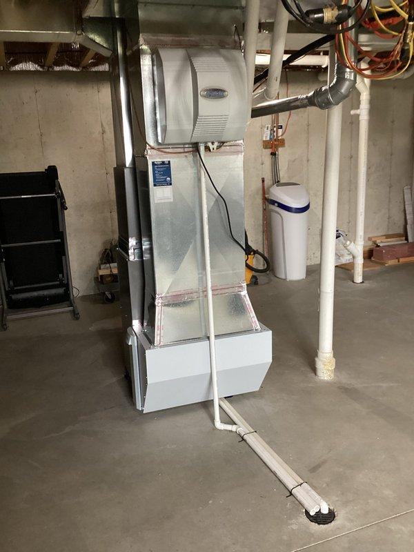 Installed Carrier humidifier unit on furnace system and integrated Air Scrubber air purification device into main supply ductwork per approved quote. Both units were mounted, wired to electrical system, connected to water supply line for humidifier operation, and programmed for optimal performance. System tested and verified operational, with customer payment collected upon completion.