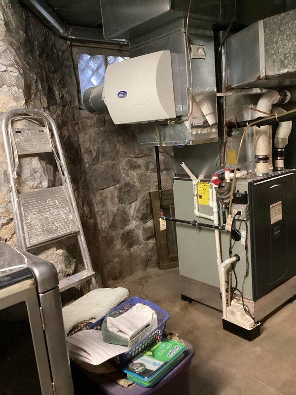 Installed new humidifier pad in existing whole-home humidification system mounted on HVAC ductwork. Removed old pad, cleaned humidifier housing, installed replacement media, and verified proper water supply connections and operation.