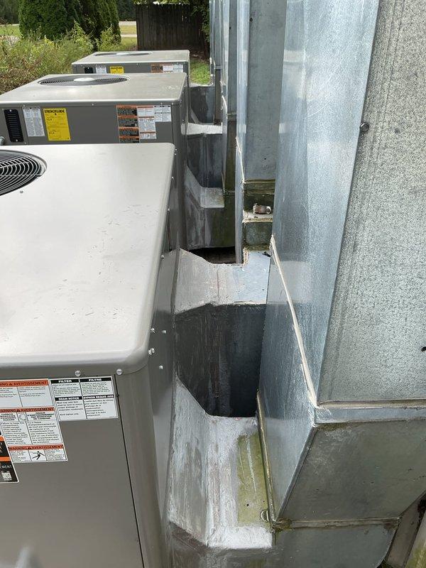 Completed installation of three-unit HVAC system including final duct transitions to units 2 and 3, and gas line connections to all three units. All equipment mounted on appropriate platforms with proper condensate drainage, ventilation clearances verified, and system ready for startup and commissioning.