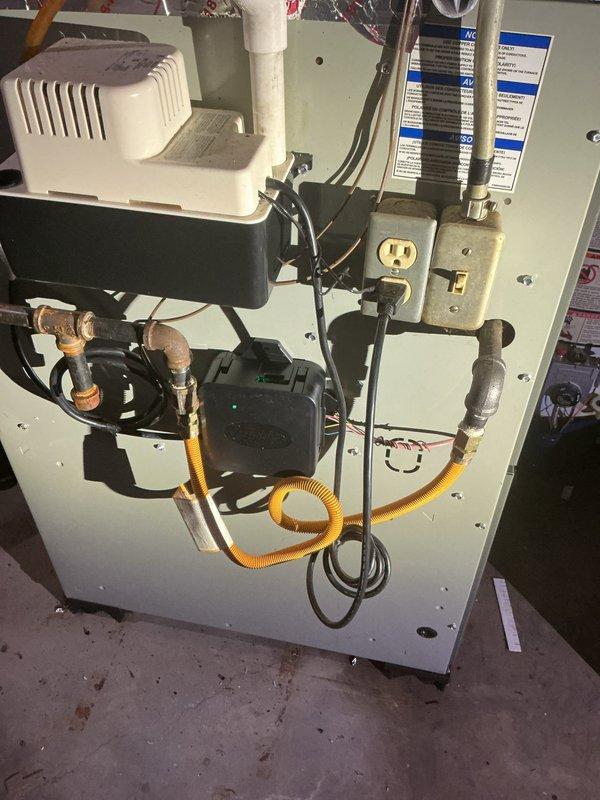 Completed installation of Lennox ML13KC1-024-230 condenser unit and CK40CT-24B-71 evaporator coil for air conditioning system. Connected refrigerant lines, established proper electrical connections, installed condensate drainage system with pump, and integrated new equipment with existing furnace infrastructure. System tested and verified operational with all components functioning within manufacturer specifications.