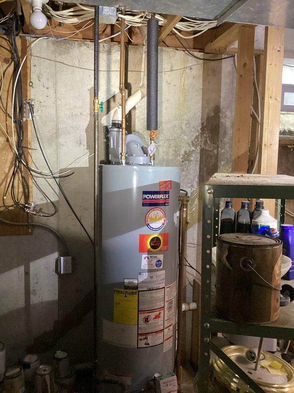 Responded to no cooling complaint on 10-year-old basement HVAC system with airflow present but no cooling output. Performed diagnostic inspection of air conditioning system, checked electrical connections, refrigerant levels, and compressor operation to identify cause of cooling failure. Additionally documented water heater leak in utility room during service visit.