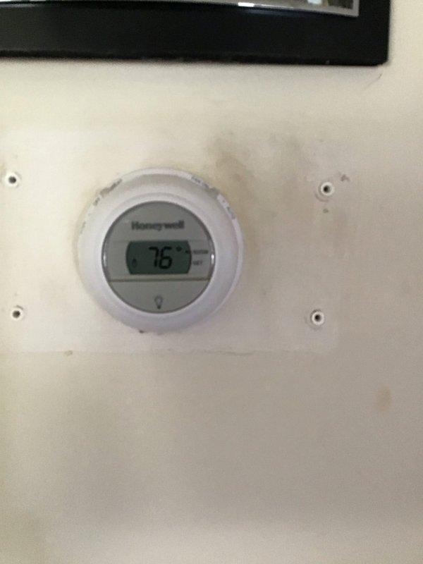 Provided comprehensive quote for new boiler system replacement at customer's request. Evaluated existing tankless water heater installation with wall-mounted unit, PVC venting, copper supply lines with shut-off valves, and Honeywell digital thermostat currently set at 76 degrees. Documented equipment configuration including internal blower assembly, flexible conduit connections, and control panel setup. Photographed complete system for quote preparation. Recommended Gold Level service agreement covering one system with annual maintenance visits, noting system is due for renewal.