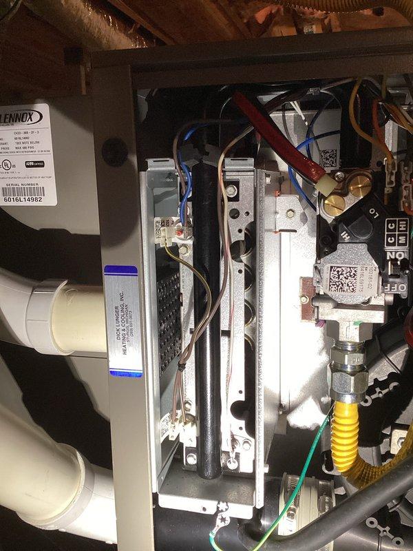 Responded to no heat call on 5-year-old Lennox furnace displaying E290 error code indicating fault in ignition circuit. Upon arrival, confirmed no airflow through vents and system inoperative. Accessed attic-mounted unit and inspected internal components including gas valve assembly, ignition system, and control board. Traced ignition circuit fault through electrical connections and verified proper gas supply via yellow flex line to brass valve assembly. Evaluated burner assembly and heat exchanger condition. Inspected air filter which showed significant dust accumulation that may have contributed to system stress. Diagnosed ignition failure, performed necessary repairs to restore ignition circuit functionality, and tested system through complete heating cycle to verify proper operation and flame sensing.