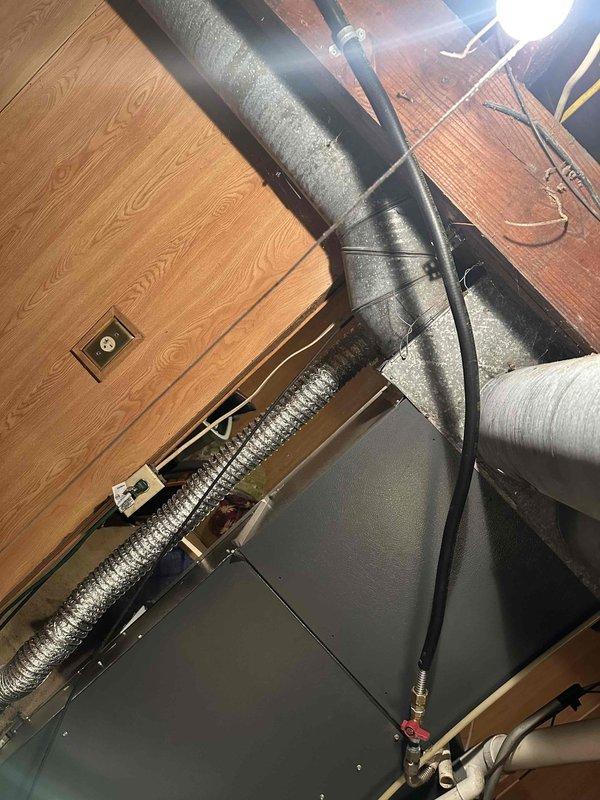 Completed installation of new gas lines in attic space to supply HVAC equipment. Routed black iron pipe through ceiling joists and around existing ductwork, ensuring proper support and clearances per code requirements. Performed pressure test on all new gas piping to verify system integrity and absence of leaks before final connection to equipment.